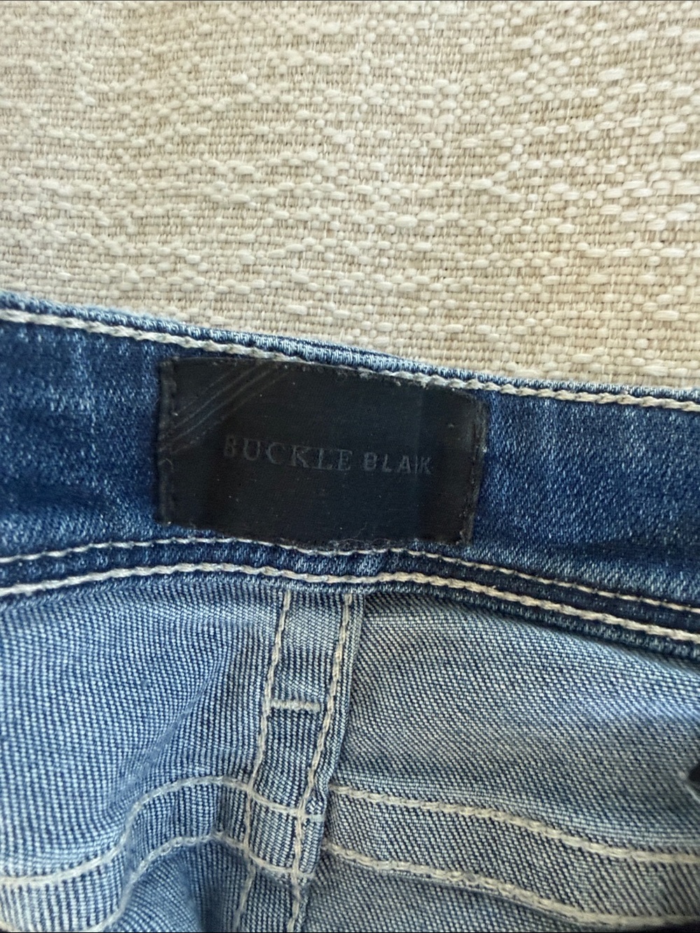 Buckle Skinny Jeans in Medium Blue Wash with Distressed Hem - Picture 4 of 5